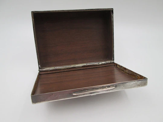 Table desk tobacco case. White alpaca. Articulated lid. Inca idol motif. 1980's