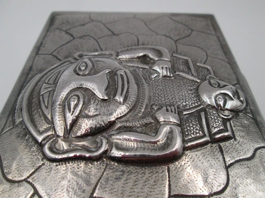 Table desk tobacco case. White alpaca. Articulated lid. Inca idol motif. 1980's