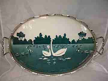 Table tray. Majolica pottery and silver metal. 1930's. Swans