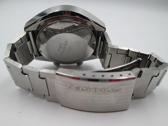 Technos Alarm Date. Stainless steel. Bracelet. Automatic. Swiss. 1970's