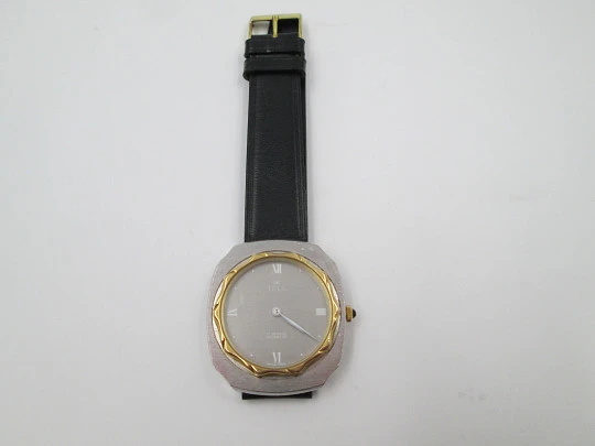 Tell. Satin metal and steel. Gold plated bezel. Manual wind. 1960's. Swiss