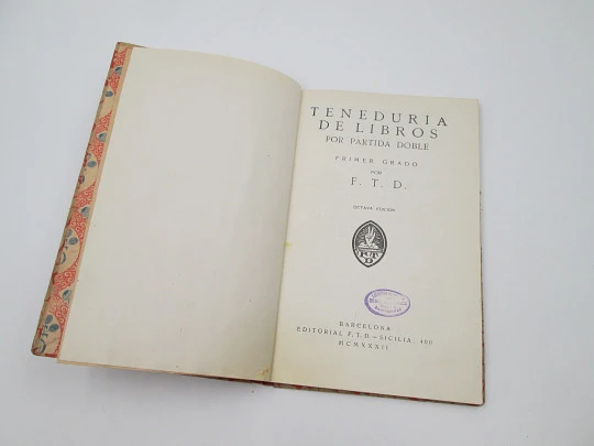 Teneduría de Libros. Primer Grado. Editorial F.T.D. Tapas duras ilustradas. 1932