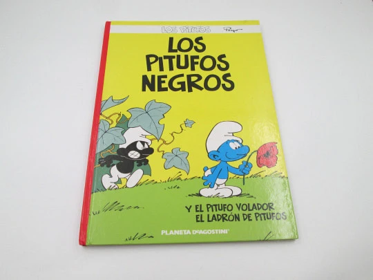 The Black Smurfs and other stories. Colour hardcover. Peyo illustrations. Planeta, 2006.