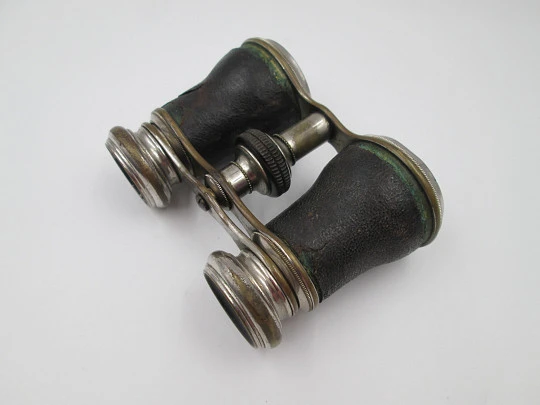 Theater and opera binoculars with case. Silver brass & black leather. Germany. 1930's Theater and opera binoculars with case. Silver brass & black leather. Germany. 1930's