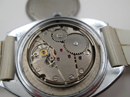 Thermidor. Jump Hours. Nickel plated metal & steel. Manual wind. Calendar. Bitone dial