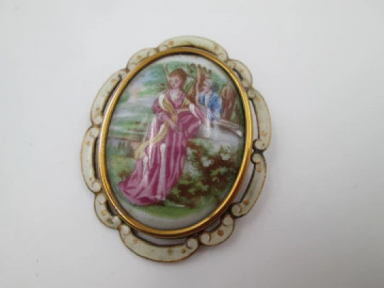 Thomas Lyster Mott brooch. Gold plated metal and painted porcelain. Courtship scene. 1940's