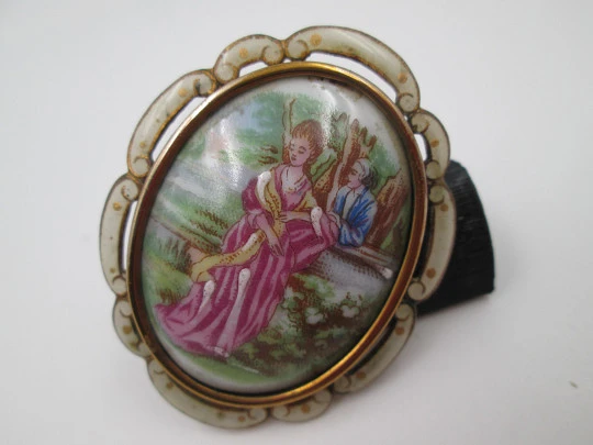 Thomas Lyster Mott brooch. Gold plated metal and painted porcelain. Courtship scene. 1940's