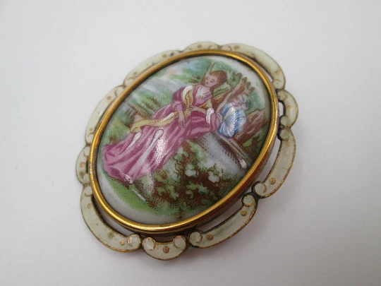 Thomas Lyster Mott brooch. Gold plated metal and painted porcelain. Courtship scene. 1940's