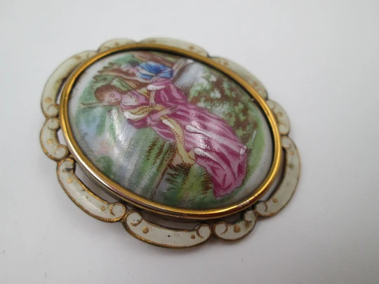 Thomas Lyster Mott brooch. Gold plated metal and painted porcelain. Courtship scene. 1940's