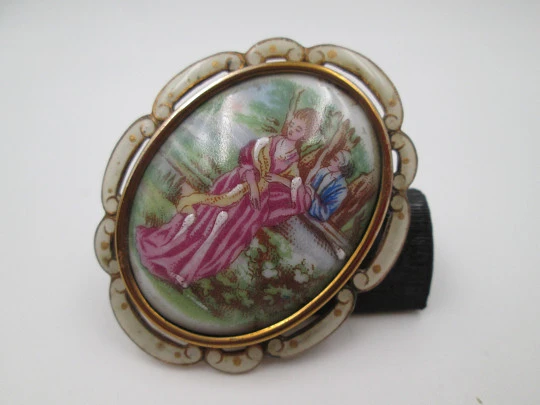 Thomas Lyster Mott brooch. Gold plated metal and painted porcelain. Courtship scene. 1940's