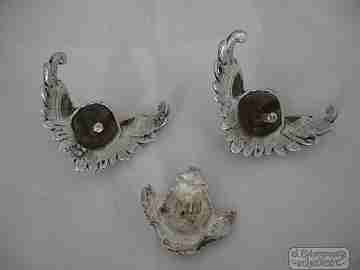 Three ancient apliques. Winged cherubs. Silver. 18-19th centuries