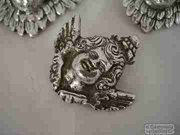 Three ancient apliques. Winged cherubs. Silver. 18-19th centuries