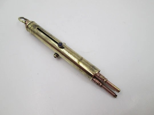 Three barrel victorian mechanical pencil. Gold plated metal and coloured stones. UK. 1890's