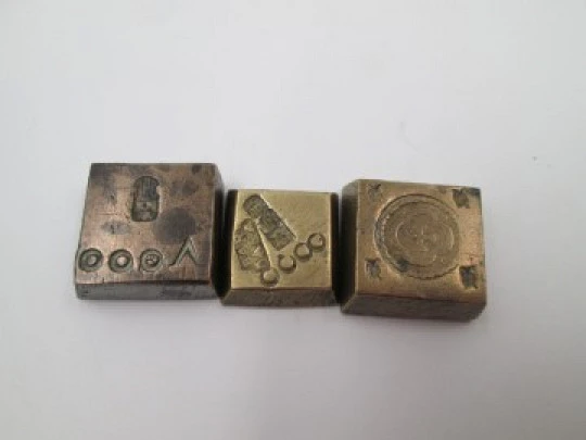 Three coin weights. Ounce & 1/2 ounce. Bronze. Spanish hallmarks. 20th century