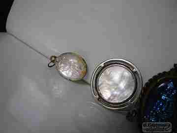 Three medals. Crystal and Pearl. Metal and silver. Virgin and Saints