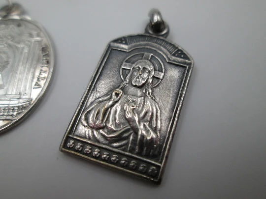 Three medals. Sterling silver. Virgin and Saint Joseph. Relief. 1920's
