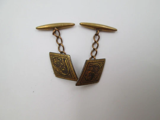 Three men's cufflinks set. Damascene and gold plated. 1970's. Spain