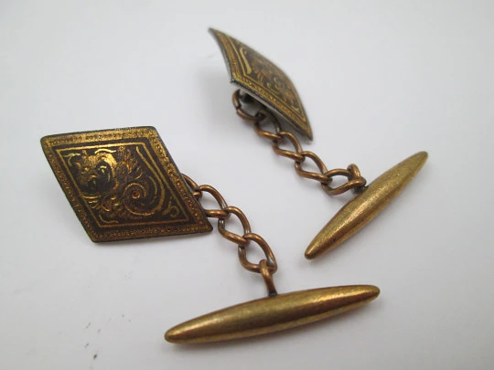 Three men's cufflinks set. Damascene and gold plated. 1970's. Spain