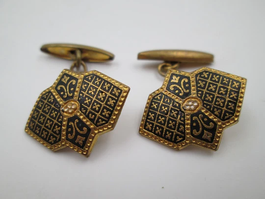 Three men's cufflinks set. Damascene and gold plated. 1970's. Spain