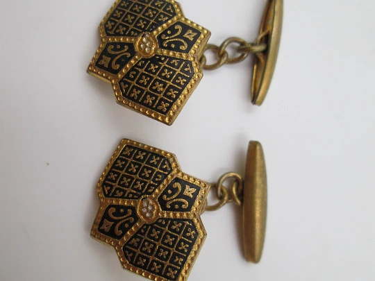 Three men's cufflinks set. Damascene and gold plated. 1970's. Spain