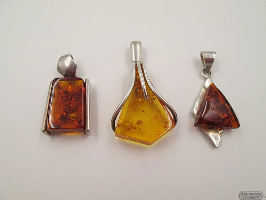 Three pendants collection. Sterling silver and amber stones