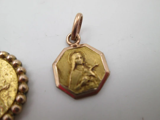 Three religious medals. Gold plated metal. Virgin Mary. Handle and ring. Spain. 1970's