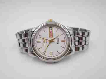 Tissot 1853. Stainless steel. White dial. Automatic. Calendar. Bracelet. 1980's. Swiss