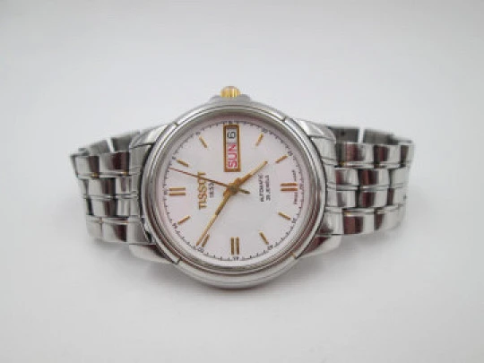 Tissot 1853. Stainless steel. White dial. Automatic. Calendar. Bracelet. 1980's. Swiss
