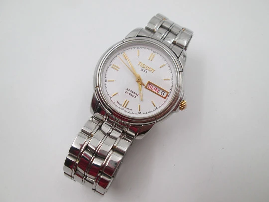 Tissot 1853. Stainless steel. White dial. Automatic. Calendar. Bracelet. 1980's. Swiss