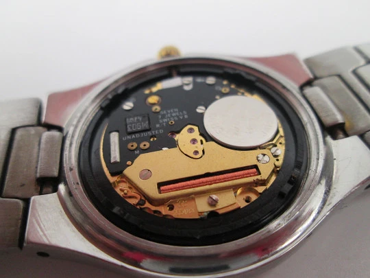 Tissot PRX quartz. Stainless steel & gold plated. Triple pointer date and Moon phase