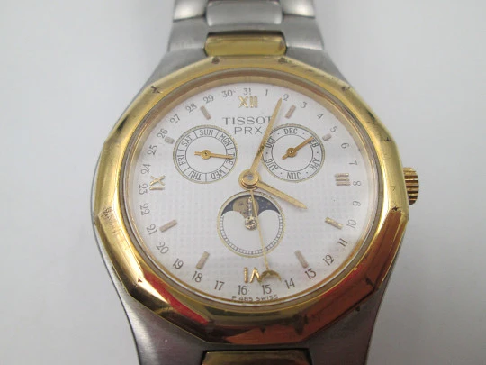 Tissot PRX quartz. Stainless steel & gold plated. Triple pointer date and Moon phase