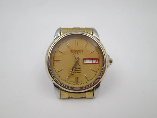 Tissot Seastar. Acero inoxidable y chapado oro. Automático. Brazalete. Calendario. 1980