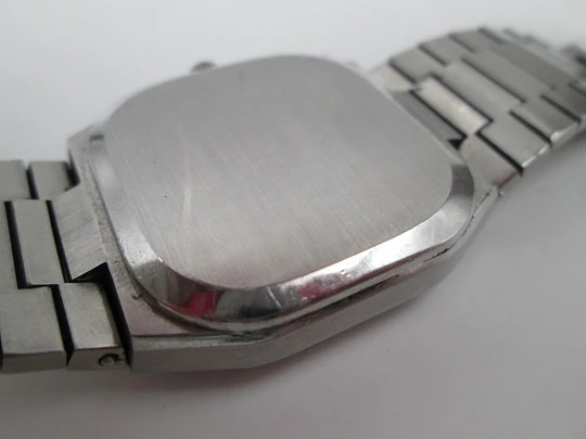 Tissot Seastar. Stainless steel. Quartz. Square case. Calendar. Bracelet. 1980's