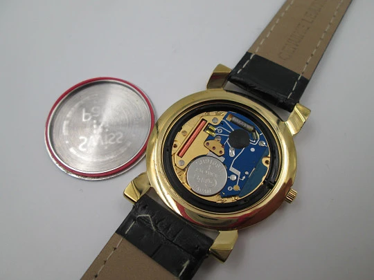 Tissot. Gold plated & stainless steel. Quartz. Leather strap. Date. 1980's