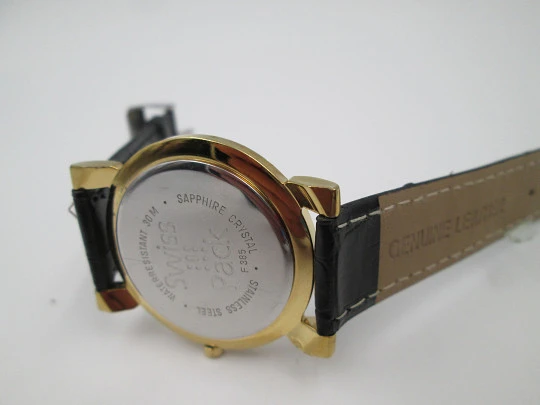 Tissot. Gold plated & stainless steel. Quartz. Leather strap. Date. 1980's
