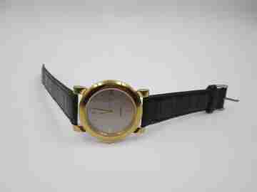 Tissot. Gold plated & stainless steel. Quartz. Leather strap. Date. 1980's