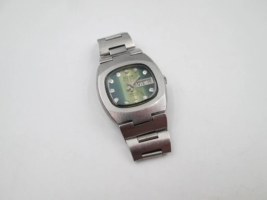 Titan Tenox. Acero inoxidable. Automático. Brazalete. Dial bicolor verde. Calendario. 1970