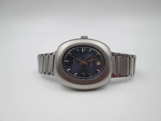 Titan. Acero inoxidable. Automático. Brazalete. Dial azul. Calendario. Estuche. 1970. Suiza