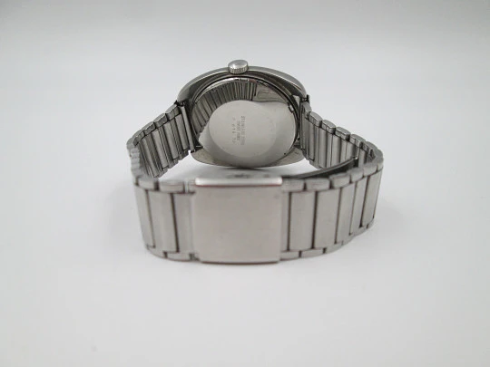Titan. Acero inoxidable. Automático. Brazalete. Dial azul. Calendario. Estuche. 1970. Suiza