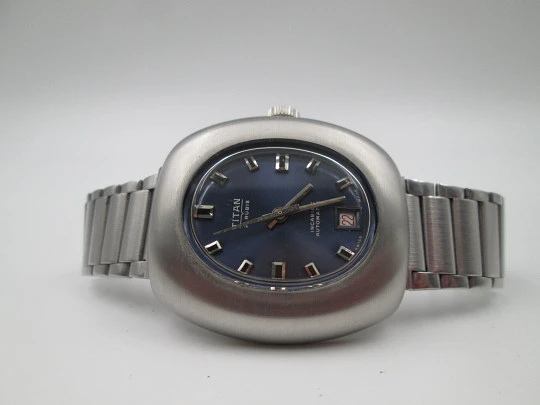 Titan. Acero inoxidable. Automático. Brazalete. Dial azul. Calendario. Estuche. 1970. Suiza