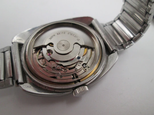 Titan. Acero inoxidable. Automático. Brazalete. Dial azul. Calendario. Estuche. 1970. Suiza