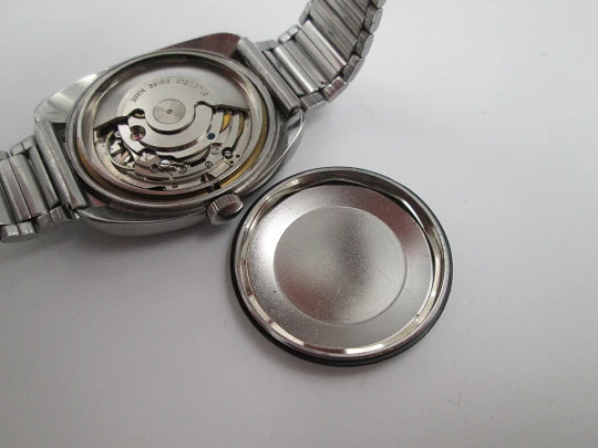 Titan. Acero inoxidable. Automático. Brazalete. Dial azul. Calendario. Estuche. 1970. Suiza