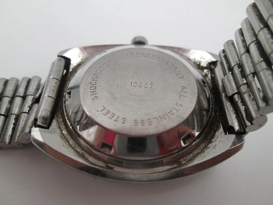 Titan. Acero inoxidable. Automático. Brazalete. Esfera gris. Calendario. 1970. Suiza