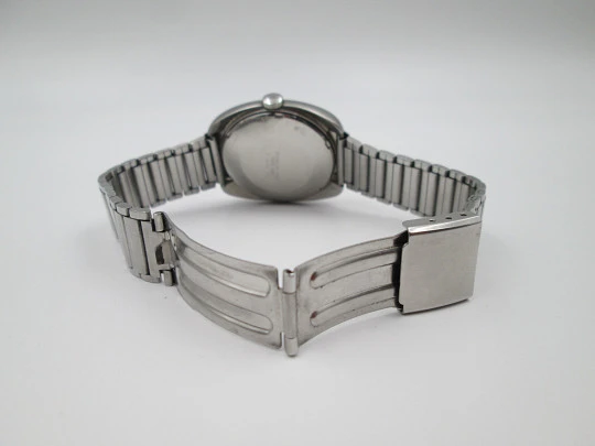 Titan. Stainless steel. Automatic. Bracelet. Blue sphere. Calendar. Box. 1970's. Swiss