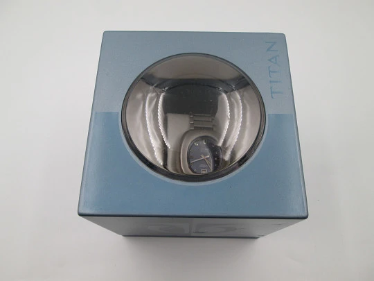 Titan. Stainless steel. Automatic. Bracelet. Blue sphere. Calendar. Box. 1970's. Swiss