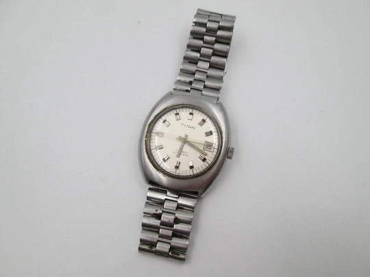 Titan. Stainless steel. Automatic. Bracelet. Grey sphere. Calendar. 1970's. Swiss