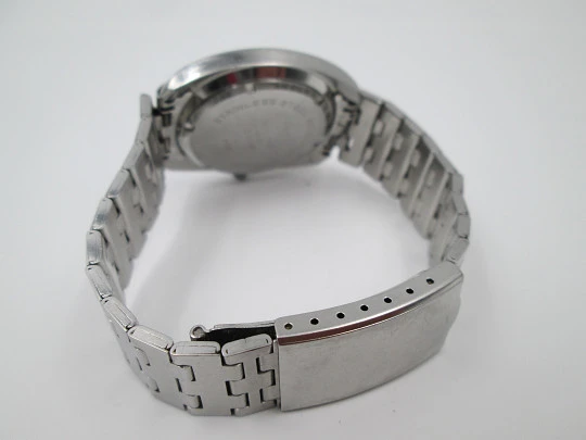 Titan. Stainless steel. Manual wind. Bracelet. Calendar. 1970's. Swiss