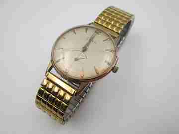Titan.10 microns gold plated and stainless steel. Automatic. 1960's. Second hand