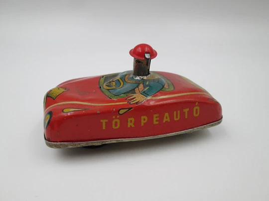 Törpeautó clockwork car. Colours lithographed tinplate. Lemezarugyar Toys. Hungary. 1980's Törpeautó clockwork car. Colours lithographed tinplate. Lemezarugyar Toys. Hungary. 1980's