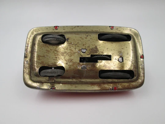 Törpeautó clockwork car. Colours lithographed tinplate. Lemezarugyar Toys. Hungary. 1980's Törpeautó clockwork car. Colours lithographed tinplate. Lemezarugyar Toys. Hungary. 1980's